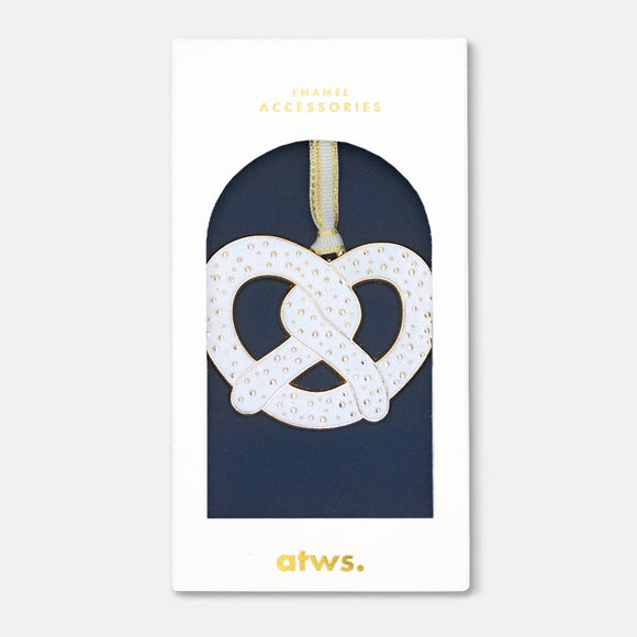 Bretzel Christmas Ornament by All the Ways to Say enamel with gold plating shaped like a pretzel holiday decoration.