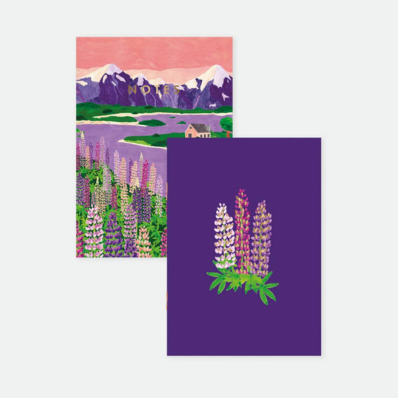 Lupin Pocket Notebook A6 Duo – illustrated covers with colorful lupin fields, mountain scenery, and minimalist floral design, by All the Ways to Say.