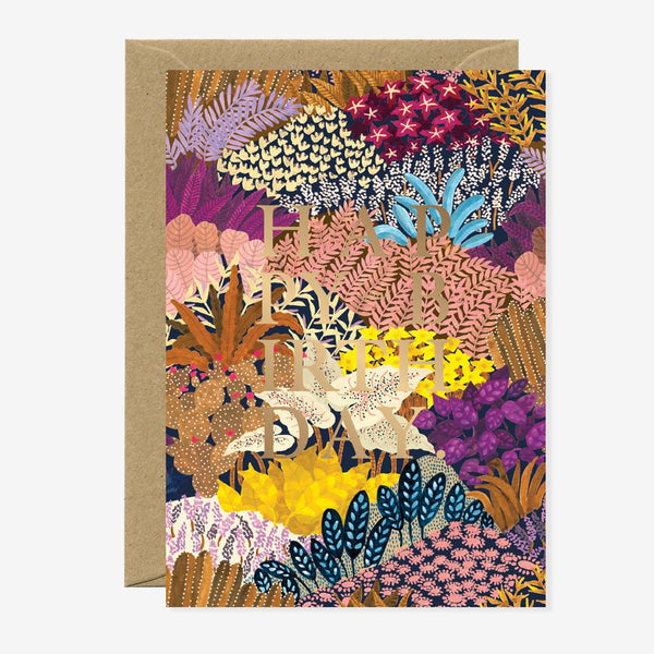 A colorful floral birthday greeting card with gold foil details, featuring a variety of plants and flowers, blank interior, and comes with a recycled brown envelope.