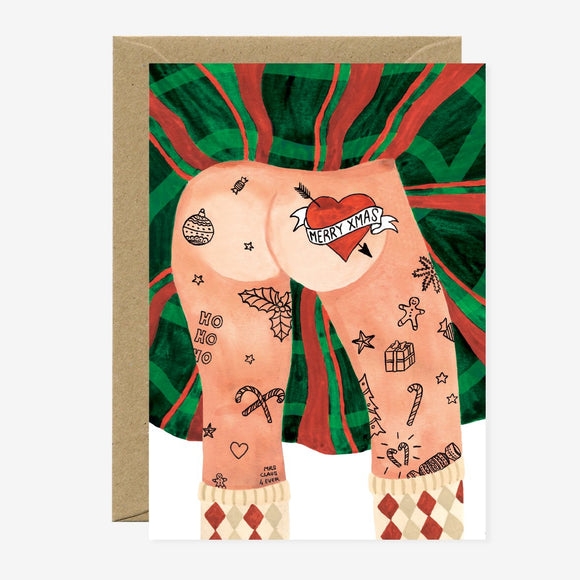 This image features a cheeky and unique Christmas greeting card, titled "Santa Tattoo - Christmas Greeting Card." The card, measuring 105mm x 148mm, showcases a playful illustration of Santa Claus' back, adorned with festive and whimsical tattoos.