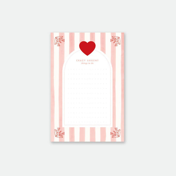 All the Ways to Say Pink Stripes Notepad A6 with pink and white stripes, red heart, and 50 pages of high-quality writing paper.