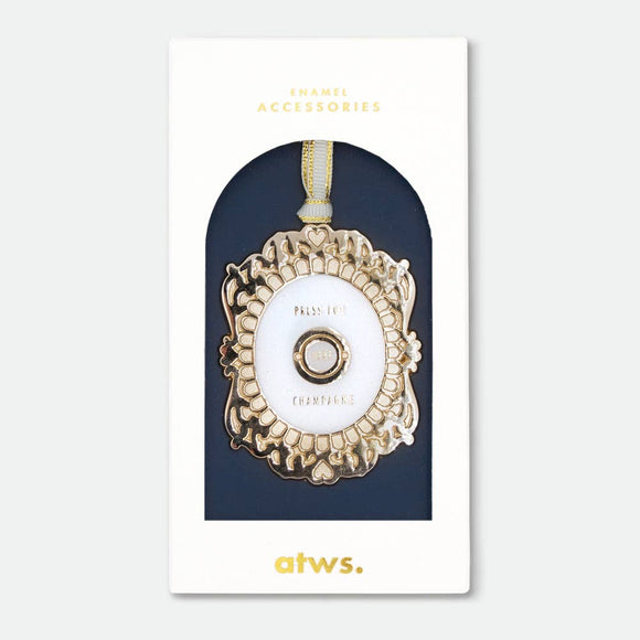 Press for Champagne Christmas Ornament by All the Ways to Say enamel with gold plating vintage bell inspired holiday decoration.