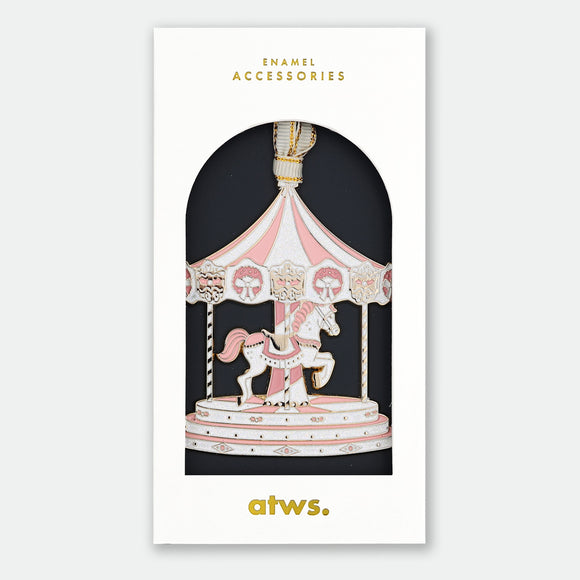 XMAS Merry Go Round Ornament by All the Ways to Say shaped like a pink carousel with horse, hand painted enamel Christmas decoration.