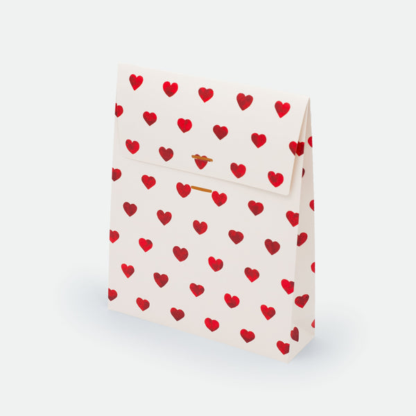 Red Hearts Gift Bag by All the Ways to Say featuring white background with red heart pattern on matte coated cardstock, available in small and large sizes.