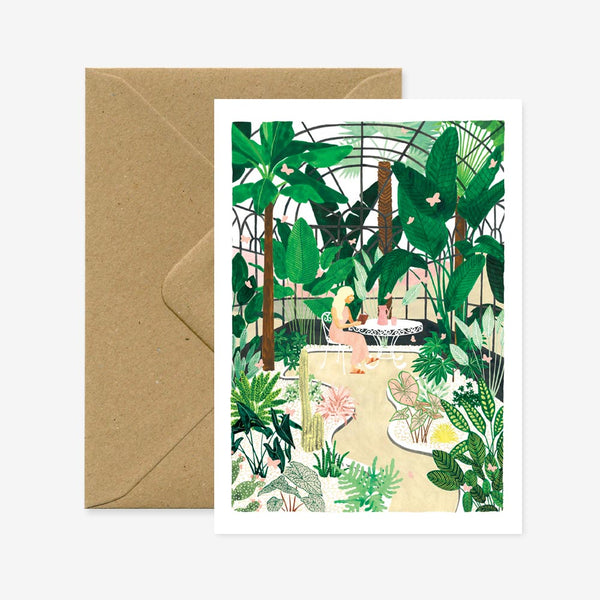 A greeting card depicting a colorful illustration of a garden with various plants and a brown envelope.