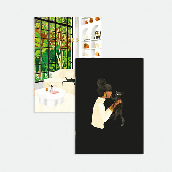 White Sofa Pocket Notebook A6 Duo – illustrated covers with cozy living room and woman holding a cat, gold foil details, by All the Ways to Say.