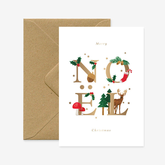 A Christmas greeting card with the letters 'NOEL' decorated with festive elements like a reindeer, Christmas tree, and snowflakes, accompanied by a brown envelope.