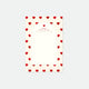 A notepad with a white background and a border of red hearts. The notepad has text at the top which seems to be a brand or product name.