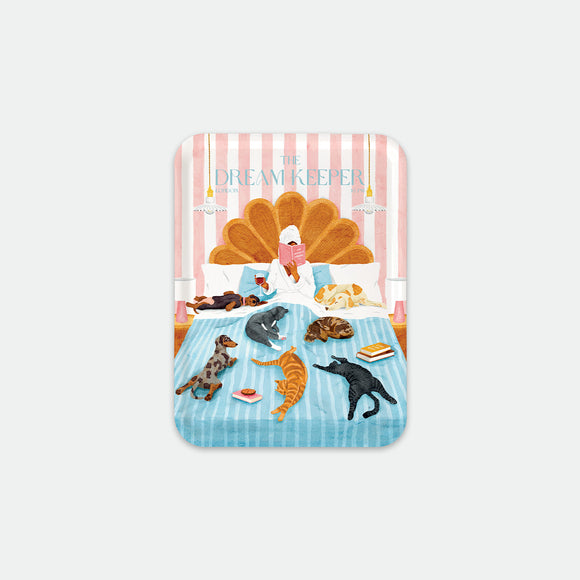 Rectangular breakfast tray with illustration of a woman reading in bed surrounded by cats and dogs on a blue blanket, The Dream Keeper by All the Ways to Say