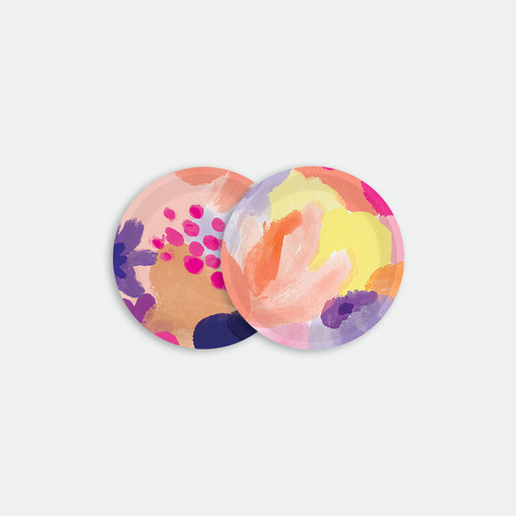 Set of two round coasters with colorful floral patterns in pink, purple, yellow and orange shades, Flower Garden by All the Ways to Say