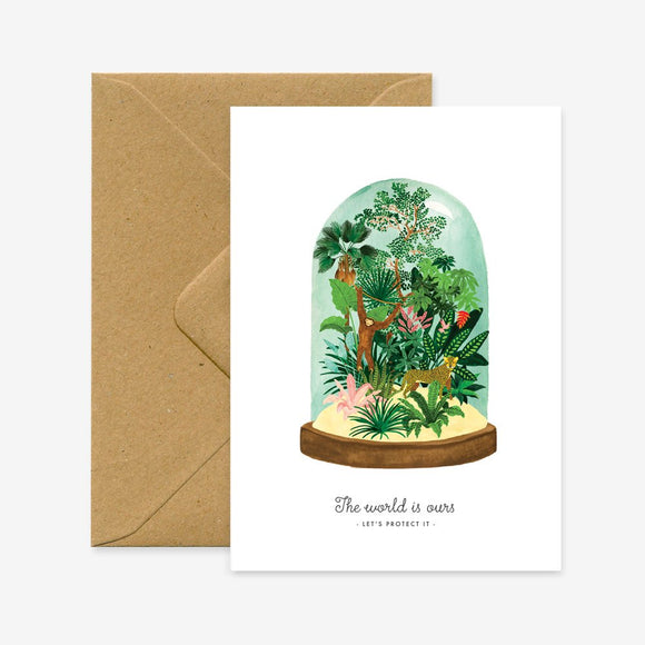 A botanical greeting card depicting a terrarium with various plants and a brown envelope.