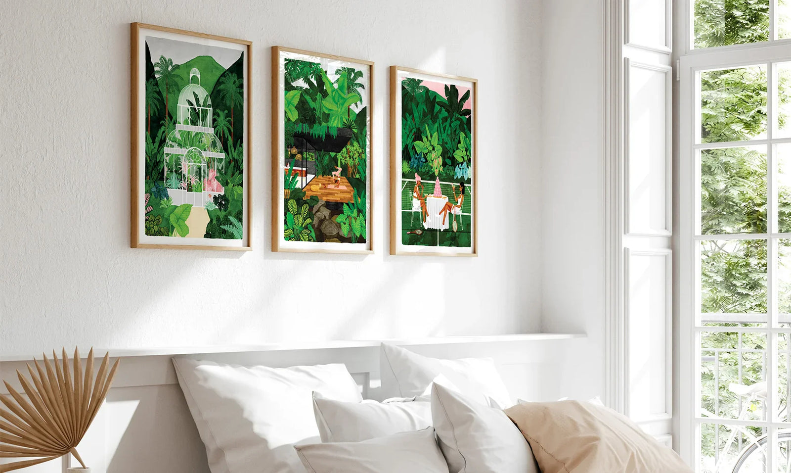 All the Ways to Say art prints – framed botanical illustrations displayed above a bright white bed