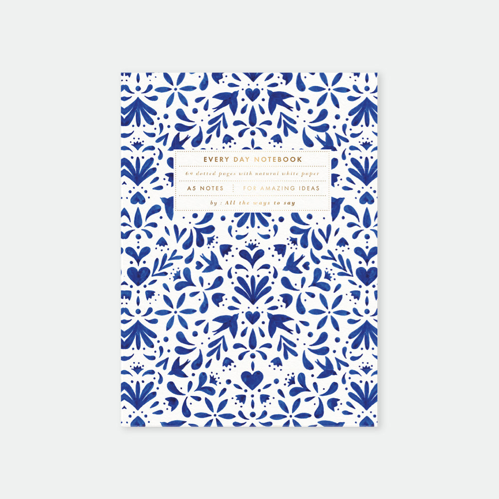 Swallows A5 Notebook by All the Ways to Say with Mediterranean-inspired indigo cover, gold foil details, 64 dotted pages, 90 gsm paper, perfect for journaling.