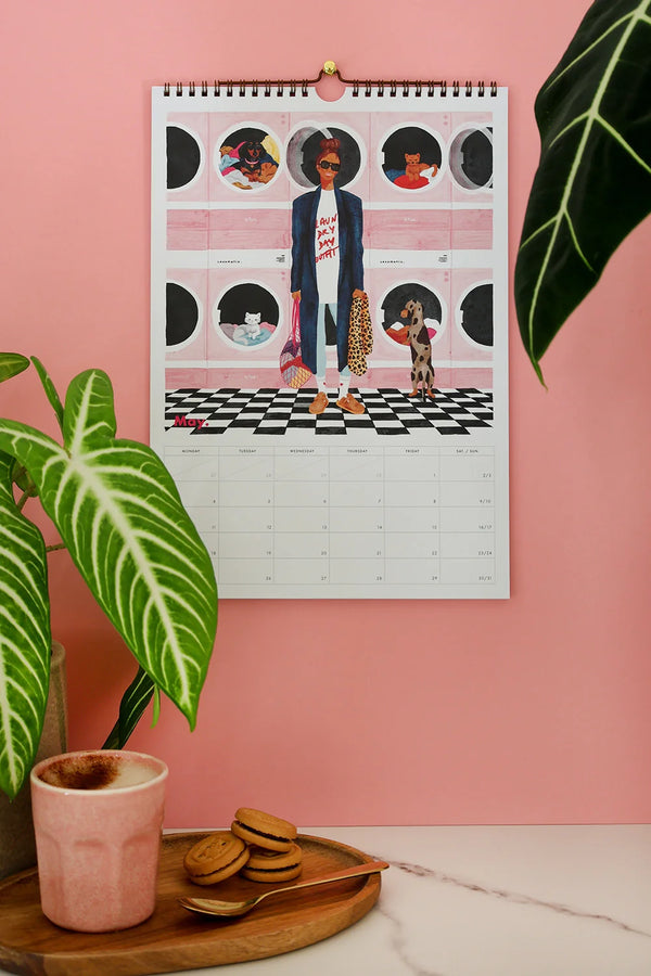 May page illustration from Daily Poetry 2026 calendar by All The Ways To Say – laundromat scene