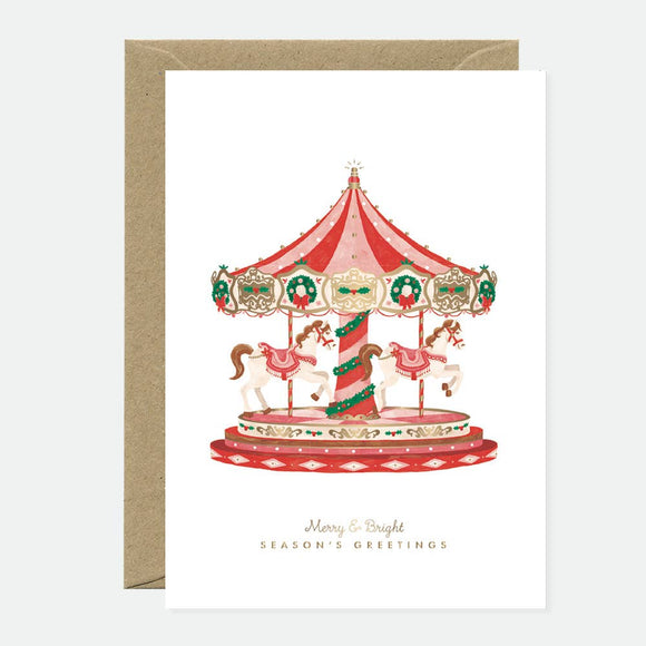 Greeting card with a carroussel illustration in gold and red on a natural white background, with text 'Mary & Briggs' and 'Season's Greetings'.