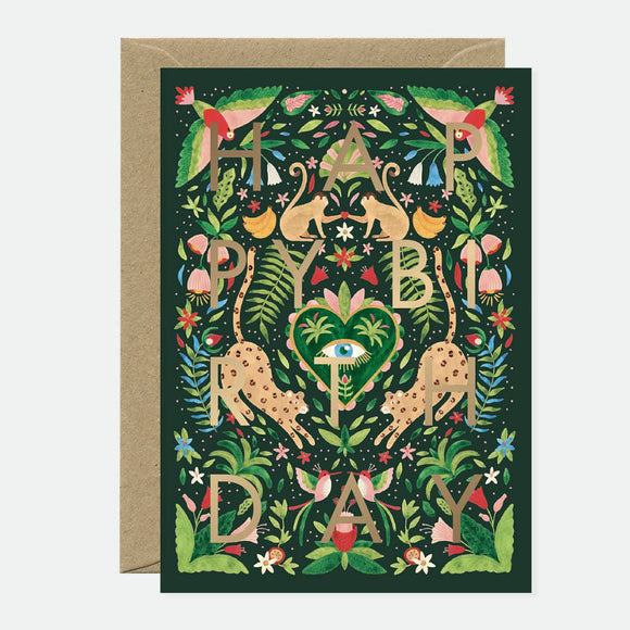 Greeting card with a green jungle design and 'Happy Birthday' text, featuring gold foil details on natural white paper.