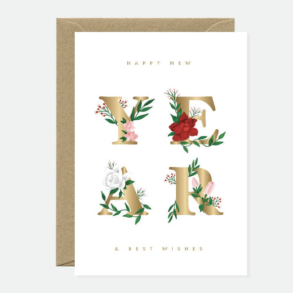 A New Year greeting card with the word "YEAR" in bold gold foil letters decorated with red, pink, and white flowers and green leaves.
