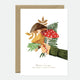 Greeting card with an illustration of a bouquet of mushrooms and greenery, with gold foil accents, held by a hand. The card has a blank interior and comes with a recycled brown envelope.
