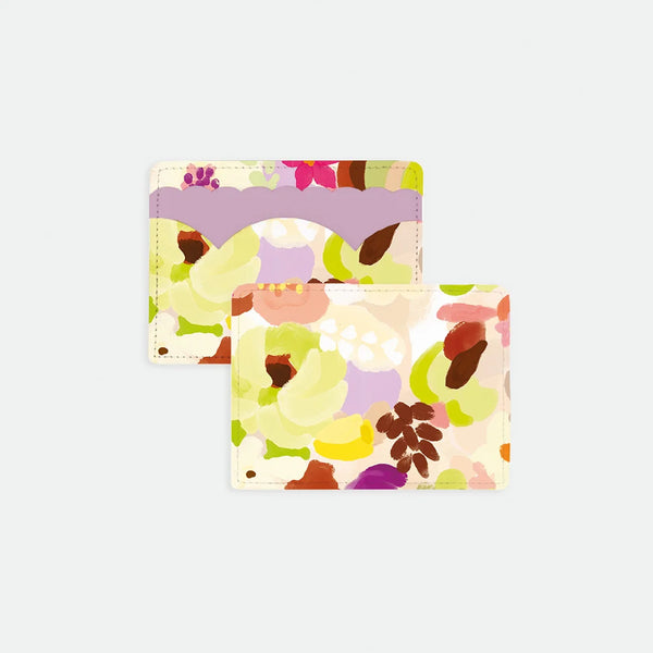 Front and back view of the Spring Sweets card holder featuring a hand-painted floral pattern in lilac, yellow, and blush with a scalloped pocket detail.