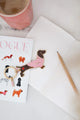 Hot Dachshund keychain styled with pink mug and pencil – cozy flatlay by All The Ways To Say
