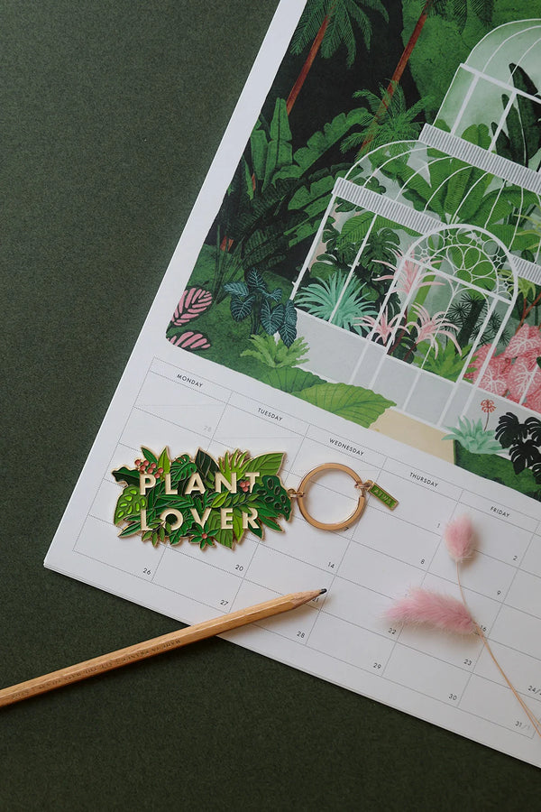 Plant Lover keychain by All The Ways To Say placed on botanical calendar – green tropical leaves design