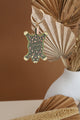 Leopard rug shaped keychain with green and pink details and gold metallic finish