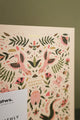 Close up of Pink Croco monthly planner cover with gold foil details and pink bird illustrations