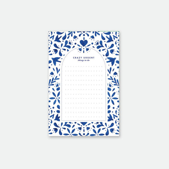 Swallows Notepad by All the Ways to Say featuring elegant blue swallow and floral motifs on white background, A6 size (10.5 x 15.7 cm), 50 pages.