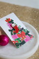 Cat Sock enamel pin on colorful Christmas card by All The Ways To Say – festive flatlay with pink and gold ornaments