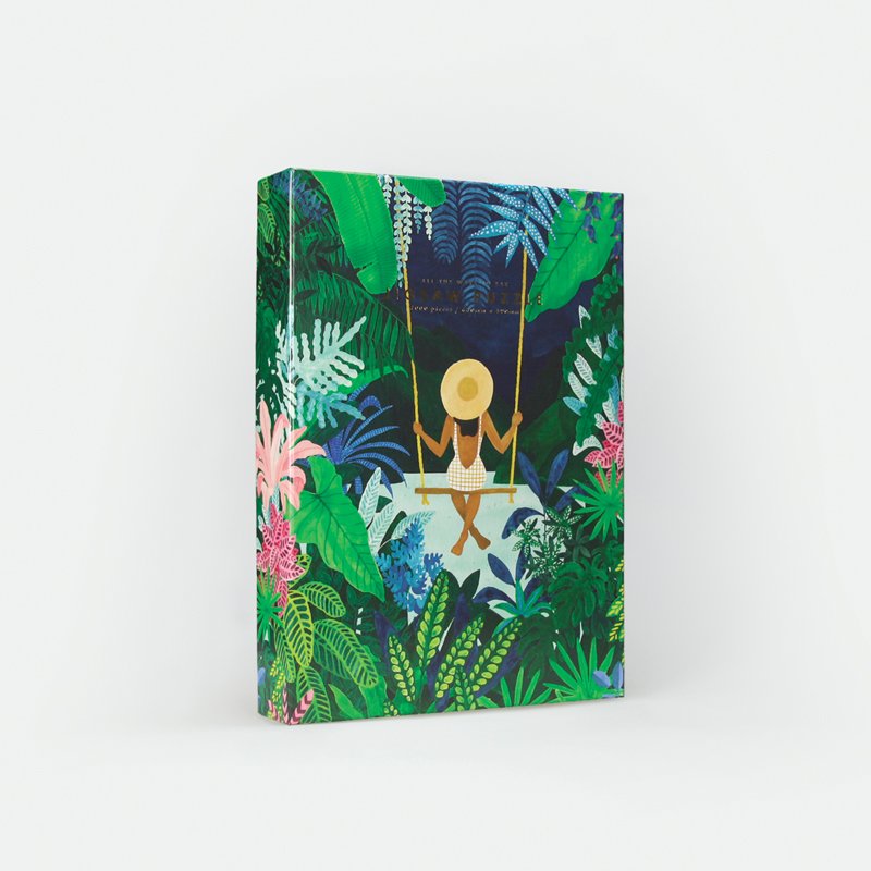 Swing jigsaw puzzle by All the Ways to Say – 1000-piece tropical puzzle showing a woman on a swing surrounded by lush green plants and colorful flowers.