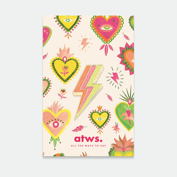A pack of two colorful enamel pins with gold plating, featuring designs such as hearts and lightning bolts.