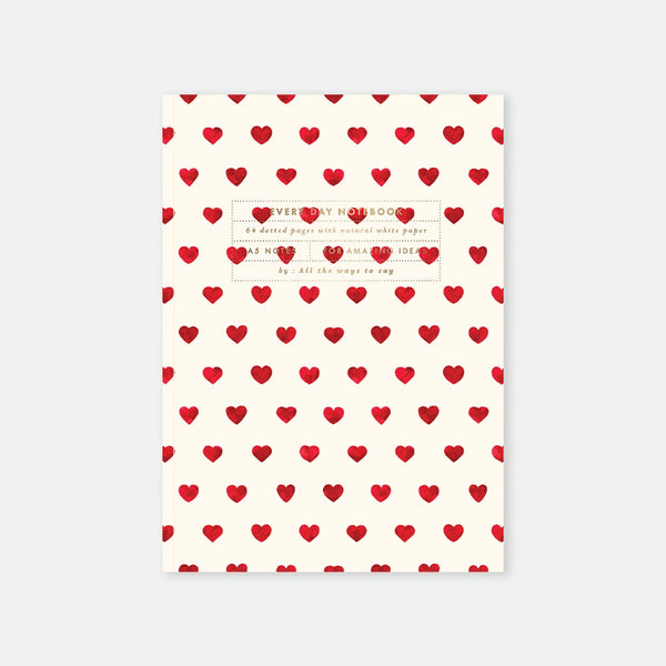 A5 notebook cover by All The Ways To Say featuring a repetitive pattern of small red watercolor hearts on a cream background.