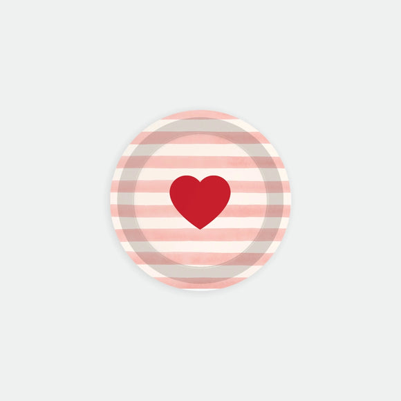 Top-down view of a round birch wood coaster by All the Ways to Say, featuring a single, large hand-painted red watercolor heart centered on a clean off-white background."