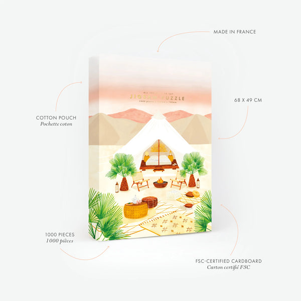 Product features of the Glamping 1000-piece jigsaw puzzle. Highlights: 68x49 cm size, FSC-certified cardboard, and Made in France. The illustration depicts a luxury desert tent at sunset with palm trees, cozy rugs, and a campfire.