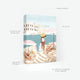 Technical details of the Italy 1000-piece puzzle by All the Ways to Say. Shows premium specs and the included cotton pouch. The artwork captures a woman in a sun hat on a rocky Mediterranean beach with pink striped umbrellas.