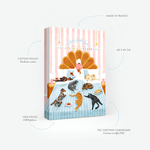 Features of the Life Without Humans 1000-piece puzzle. Details: French-made, eco-friendly FSC cardboard. The charming scene shows a woman reading in a grand bed surrounded by many sleeping cats and dogs.