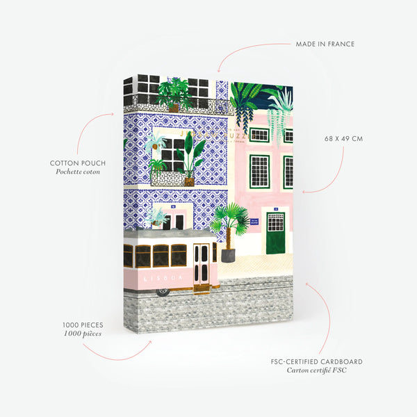 Product specifications for the Lisboa 1000-piece puzzle. Information on the 68x49 cm format and cotton storage bag. The illustration features the iconic pink Lisbon tram passing by buildings with traditional blue azulejo tiles.