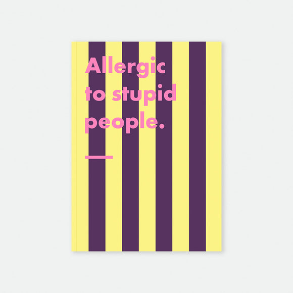 Allergic To Stupid People A5 notebook cover by All The Ways To Say, bold purple and yellow striped design with "Allergic to stupid people." text in pink lettering