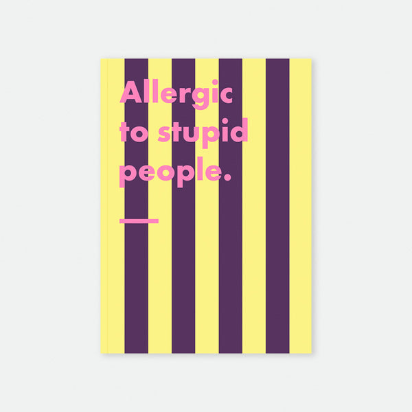 Allergic To Stupid People A5 notebook cover by All The Ways To Say, bold purple and yellow striped design with "Allergic to stupid people." text in pink lettering