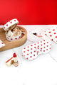 Red Hearts jewelry case and glasses case with red hearts pattern, styled with red lipstick and wooden tray.
