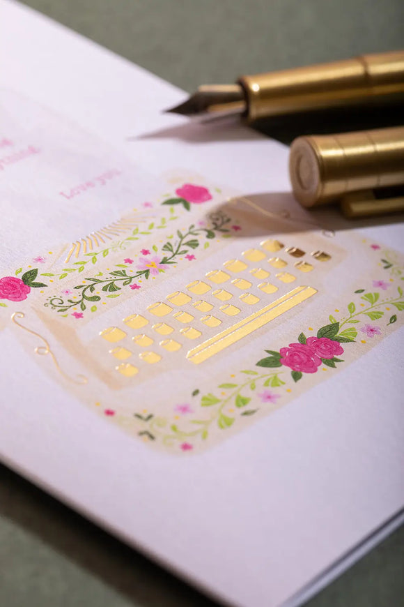 Love you mum typewriter Greeting card - Close-up on the hand-painted typewriter illustration and pink flowers.