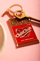 Chit chat Keychain - Detailed view of the red enamel chocolate bar with "Chit Chat" text.