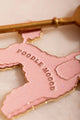 Poodle mood Keychain - Macro shot highlighting the pink glittery enamel and golden metal finish.