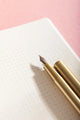 Notebook A5 Life With Pets & Plants - Close-up of the premium dotted paper and a golden fountain pen.