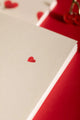 Notebook A5 New Hearts - Interior view of the white pages featuring a small red heart detail.