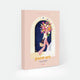 Parisian Door paint by numbers kit box by All The Ways To Say, illustration of a woman walking away from a blue Parisian doorway numbered 7, carrying a large bouquet of flowers and a woven basket, "paint art. The Paint By Number Kit by All The Ways To Say"