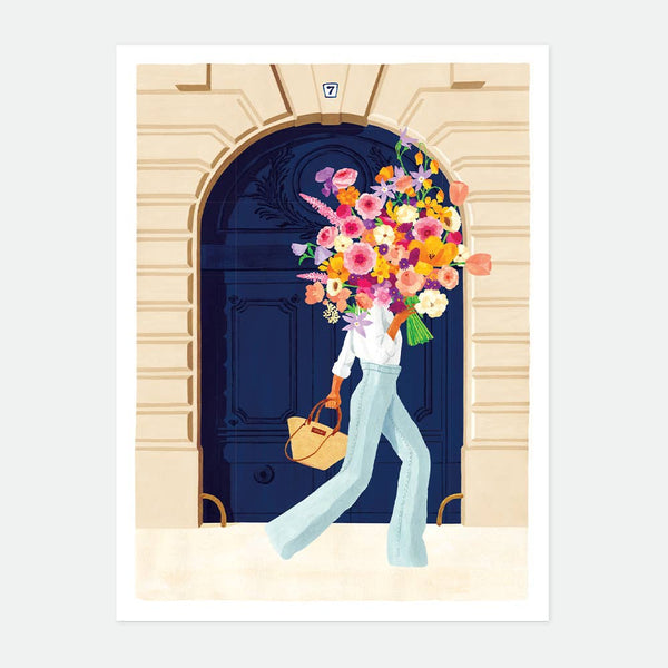 French style illustration of a woman carrying a giant colorful flower bouquet in front of a classic blue Parisian door.