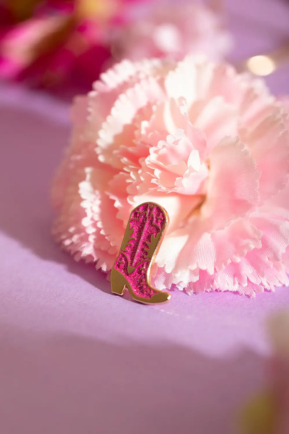Pink Santiag - Pins: the glittery pink western boot pin styled against a beautiful pink carnation flower.