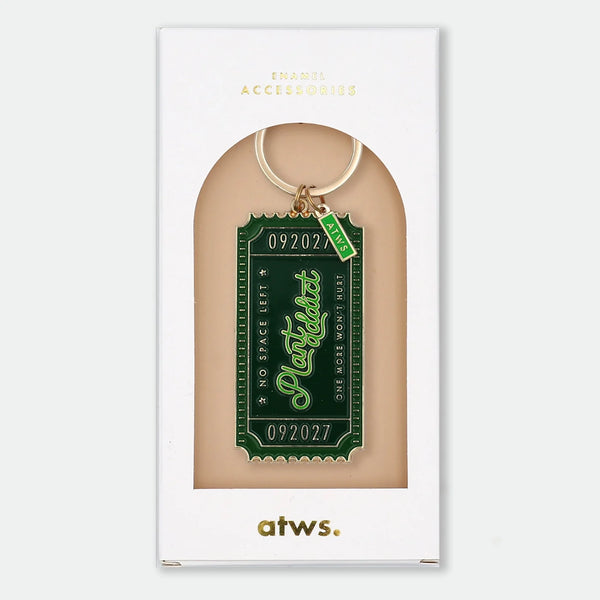 Enamel and metal keychain shaped like a vintage admission ticket, green with text reading "092027, Plant Addict, No space left, one more won't hurt," gold-tone ring and "ATWS" charm