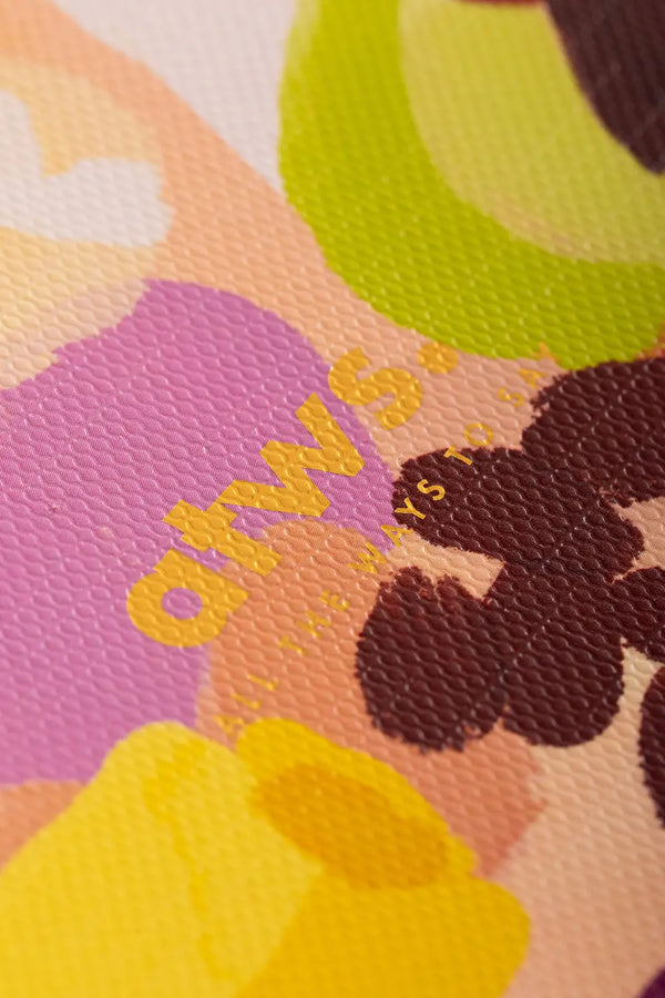 Spring Sweets Pocket Notebook A6 DUO - Macro view of the gold foil atws. logo on textured paper.